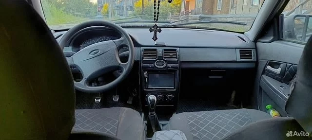Фото автомобиля LADA 2172 PRIORA, 2008 — госномер Е457СУ186. Цвет: Темно-зеленый