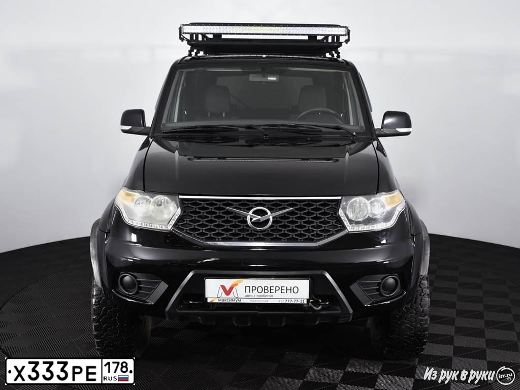 Фото автомобиля UAZ 3163 PATRIOT, 2017 — госномер О486РМ198. Цвет: ЧЕРНЫЙ МЕТАЛЛИК