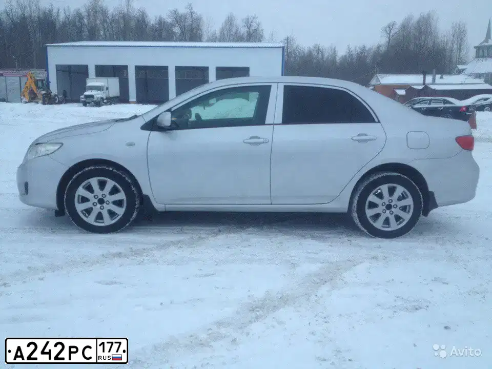 Фото автомобиля TOYOTA COROLLA, 2006 — госномер К810НЕ21. Цвет: СЕРЕБРИСТЫЙ