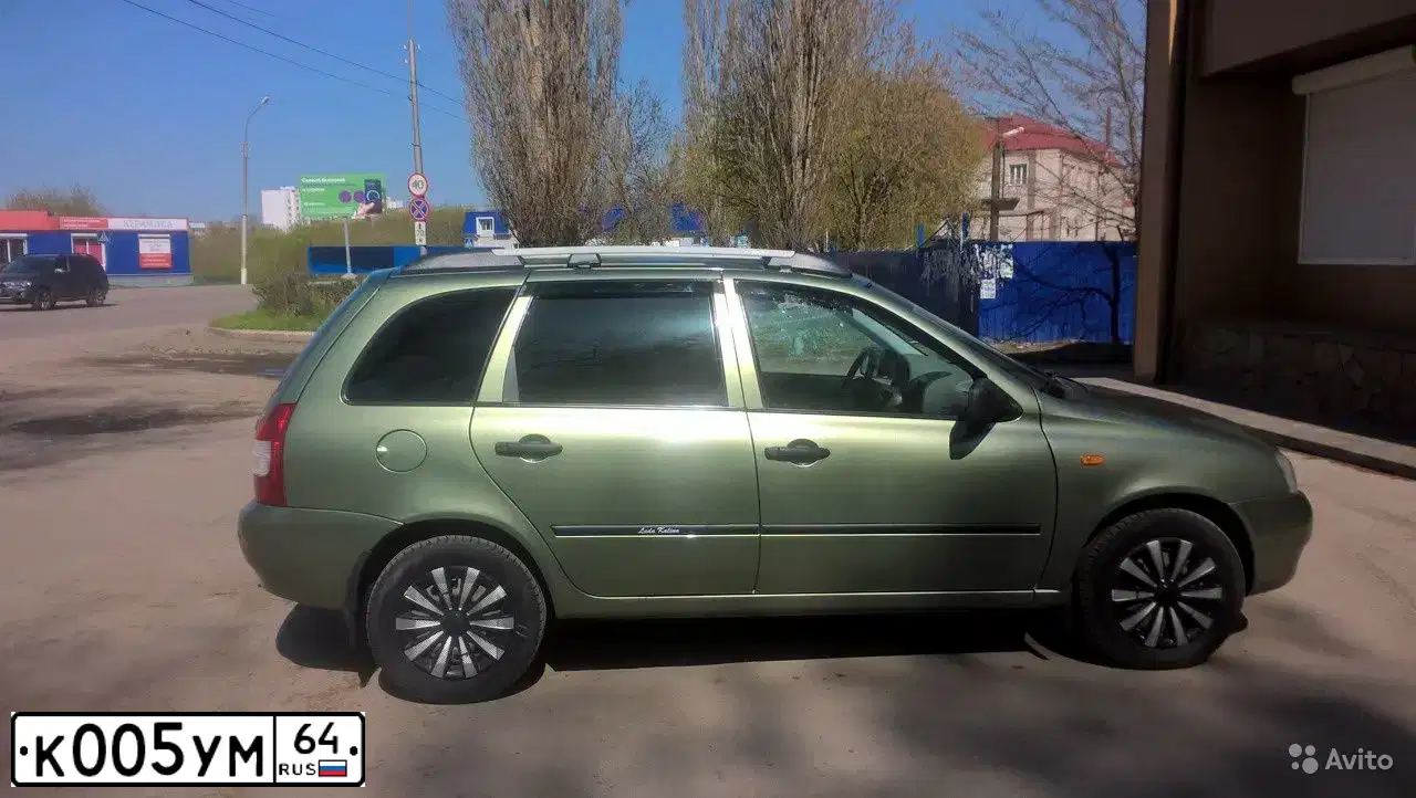 Фото автомобиля LADA 1117 KALINA, 2011 — госномер К005УМ64. Цвет: СВЕТЛО ЗЕЛЕНЫЙ