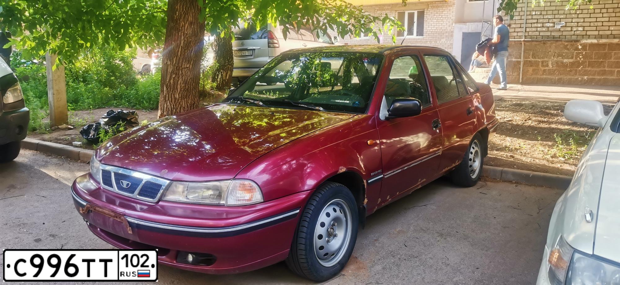 Фото автомобиля DAEWOO NEXIA, 2007 — госномер С996ТТ102. Цвет: КРАСНЫЙ (СПЕЛАЯ ВИШНЯ)