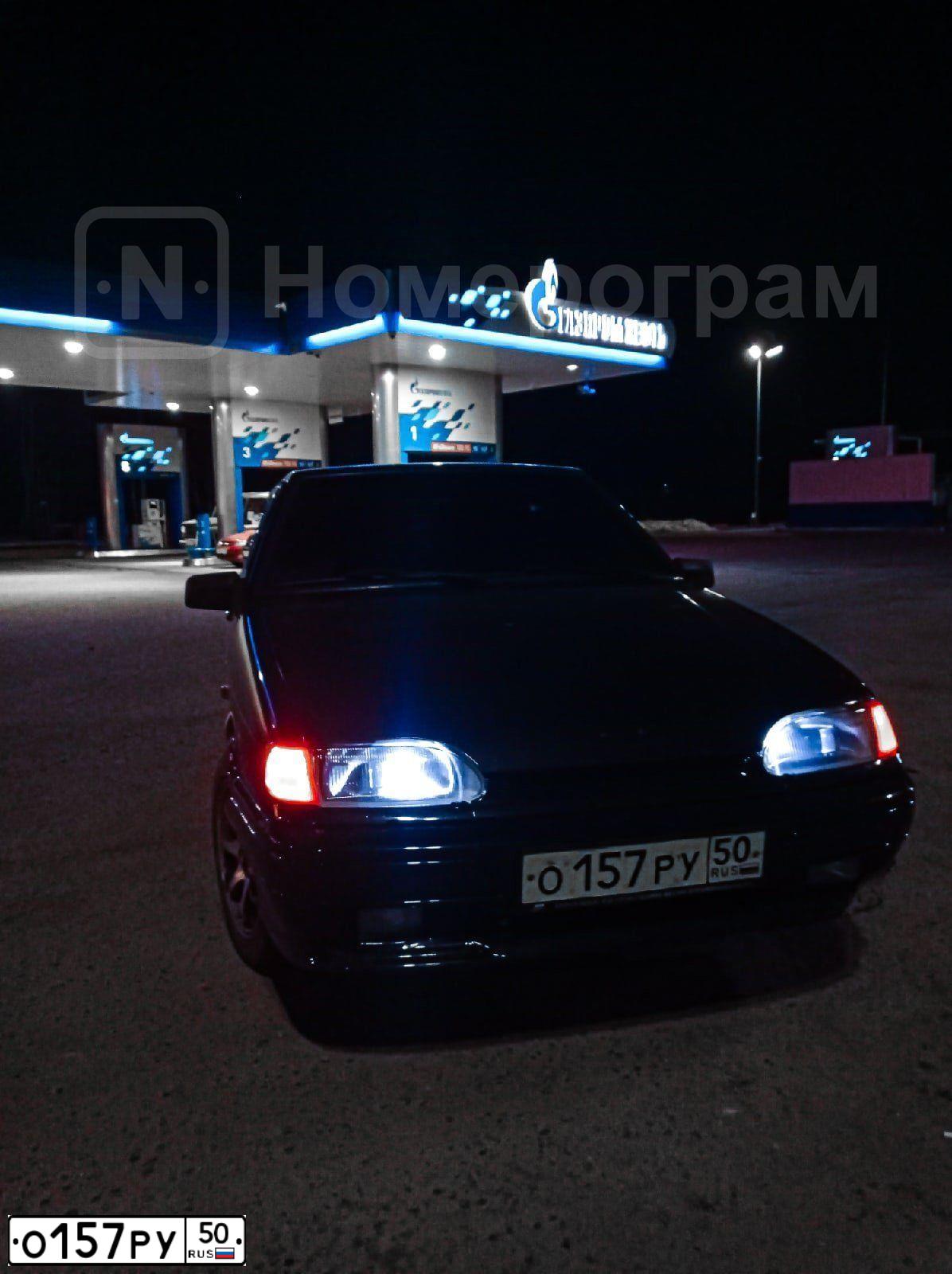 Фото автомобиля LADA 2114 SAMARA, 2013 — госномер О157РУ50. Цвет: СИНЕ-ЧЕРНЫЙ