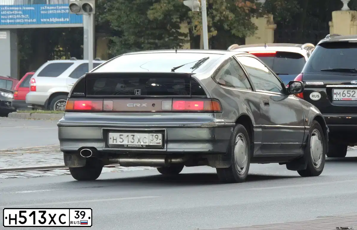 Фото автомобиля HONDA CIVIC, 1993 — госномер Н513ХС39. Цвет: СЕРЫЙ