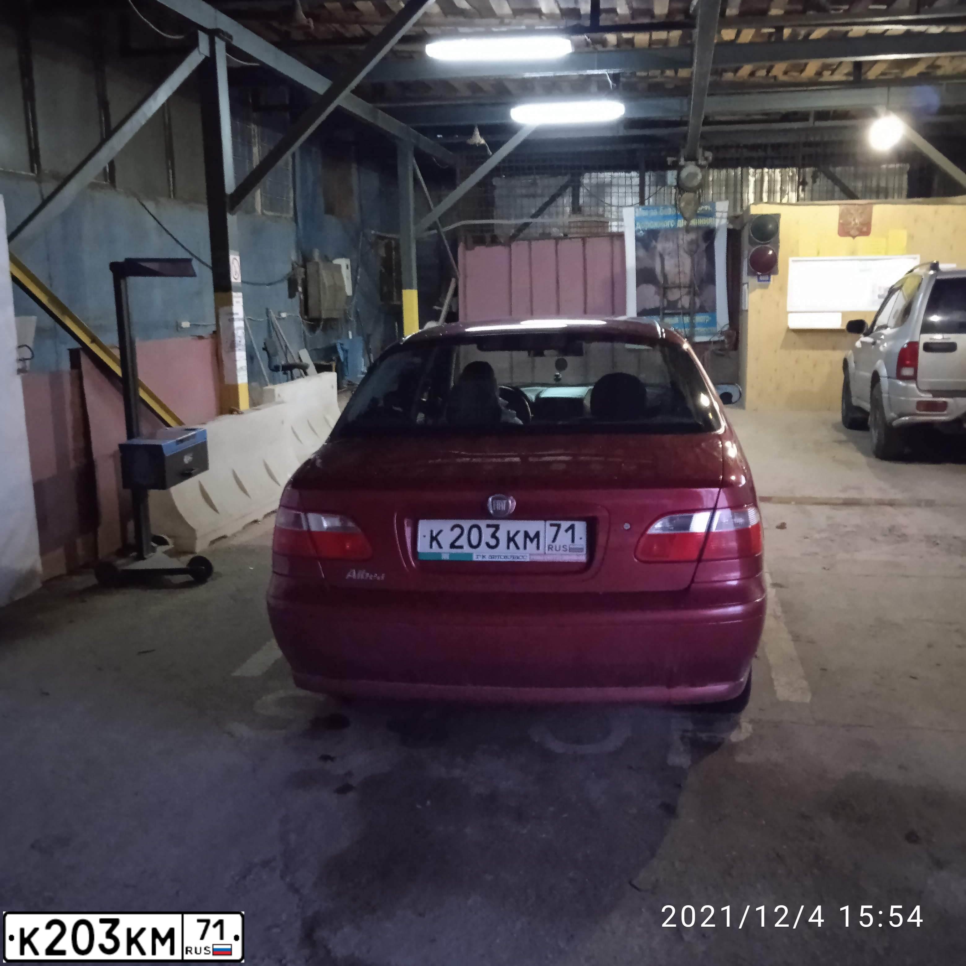 Фото автомобиля FIAT ALBEA, 2010 — госномер К203КМ71. Цвет: КРАСНЫЙ СЦИЛЛА