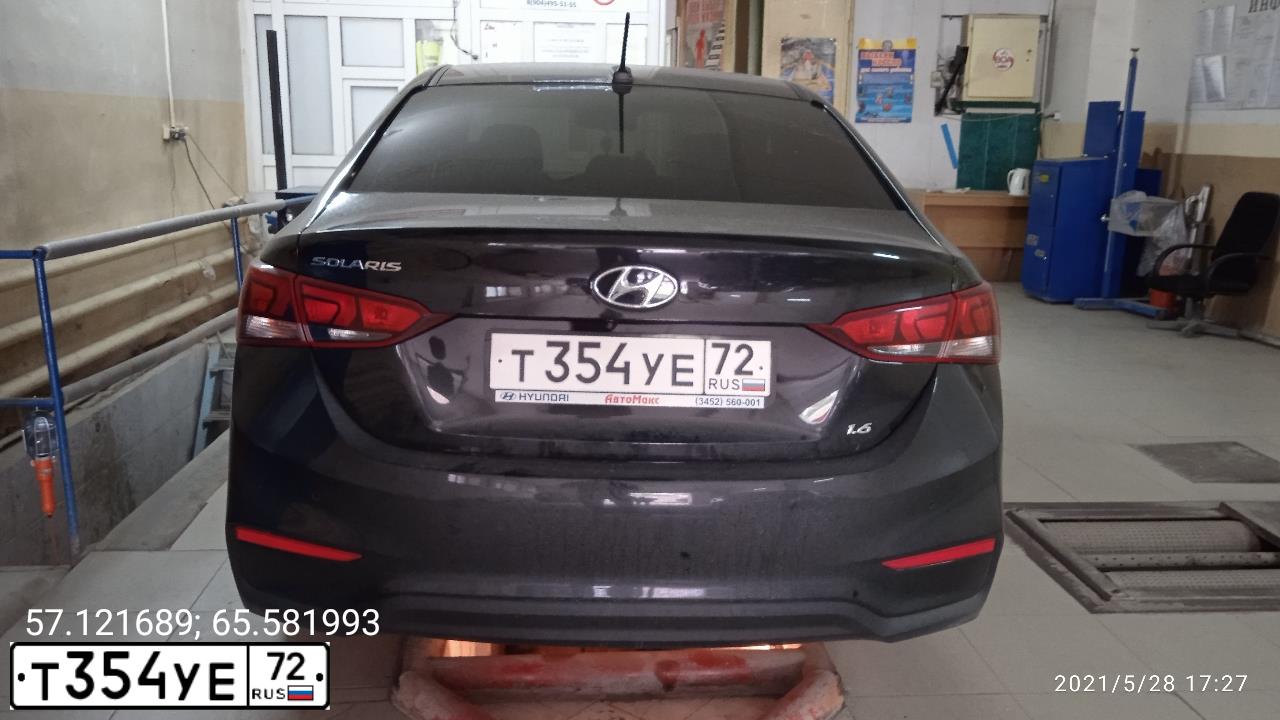 Фото автомобиля HYUNDAI SOLARIS, 2017 — госномер Т354УЕ72. Цвет: ЧЕРНЫЙ