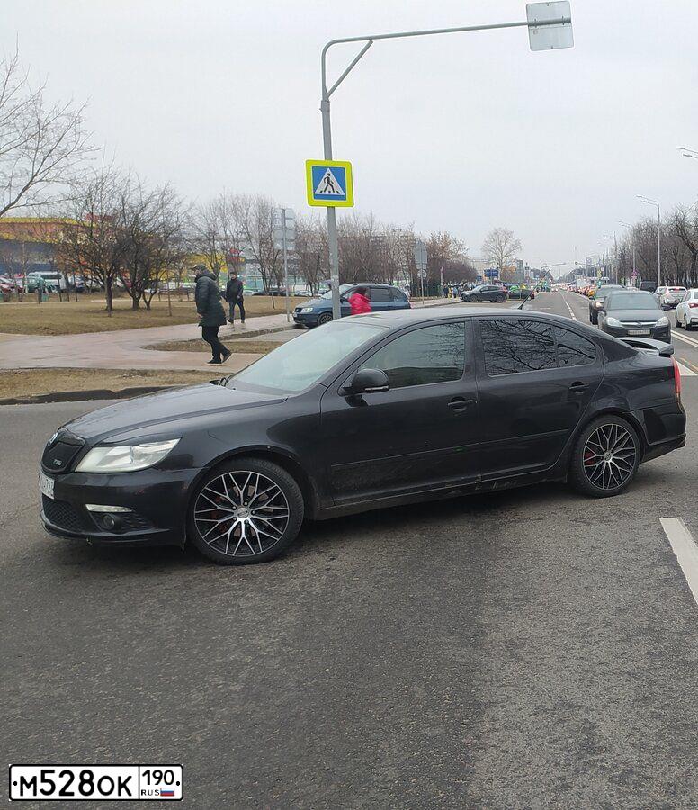 Фото автомобиля SKODA OCTAVIA, 2011 — госномер К073АМ550. Цвет: ЧЕРНЫЙ