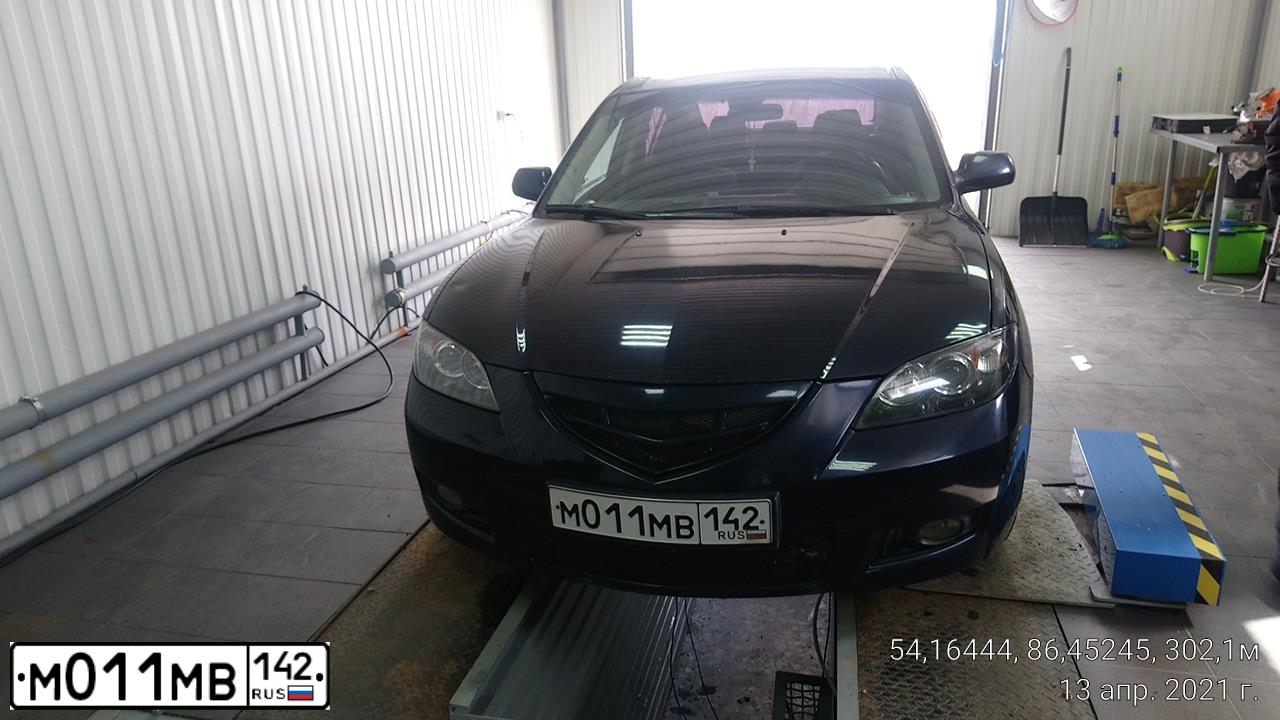 Фото автомобиля MAZDA 3, 2008 — госномер М011МВ142. Цвет: ТЕМНО-СИНИЙ