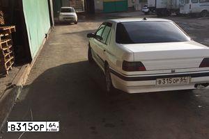Фото автомобиля PEUGEOT 605, 1991 — госномер В315ОР64. Цвет: Белый