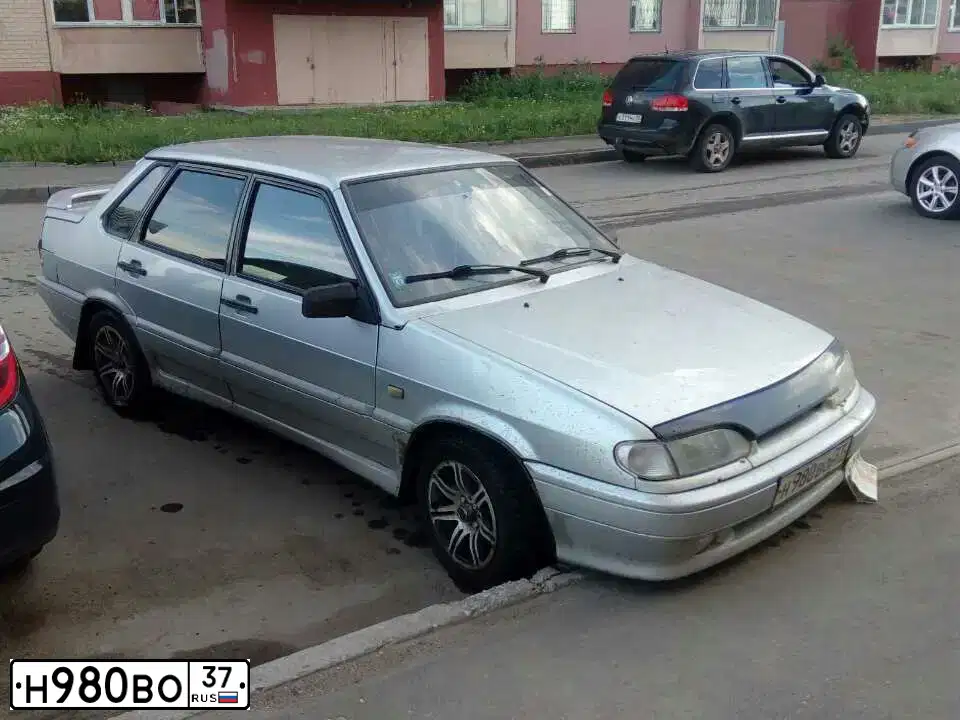 Фото автомобиля LADA 2115 SAMARA, 2001 — госномер Н980ВО37. Цвет: СВЕТЛО-СЕРЫЙ