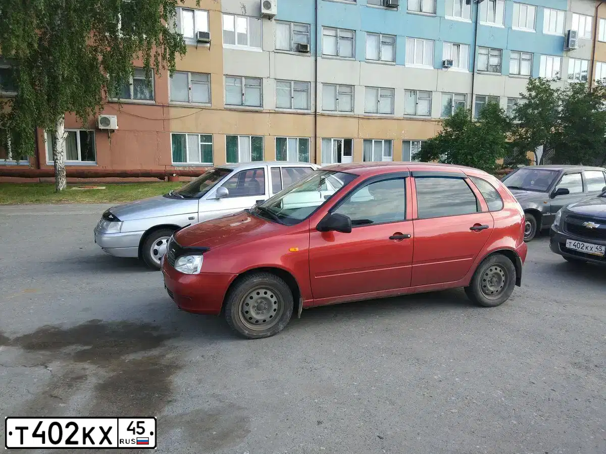 Фото автомобиля CHEVROLET COBALT, 2014 — госномер Т402КХ45. Цвет: СЕРЫЙ