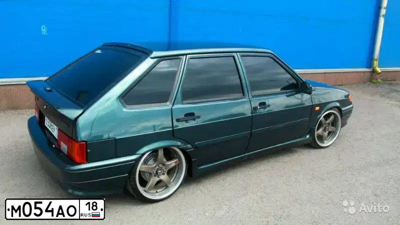 Фото автомобиля LADA 2114 SAMARA, 2009 — госномер В910НО702. Цвет: СЕРО-СИНЕ-ЗЕЛЕНЫЙ