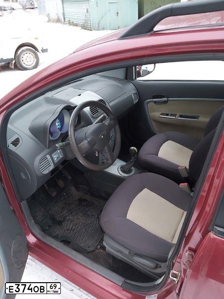 Фото автомобиля CHERY KIMO /A1/, 2009 — госномер Т777СТ69. Цвет: ТЕМНО-КРАСНЫЙ