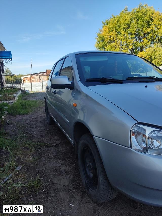 Фото автомобиля LADA 1117 KALINA, 2010 — госномер М987ХА18. Цвет: СЕРЕБРИСТЫЙ