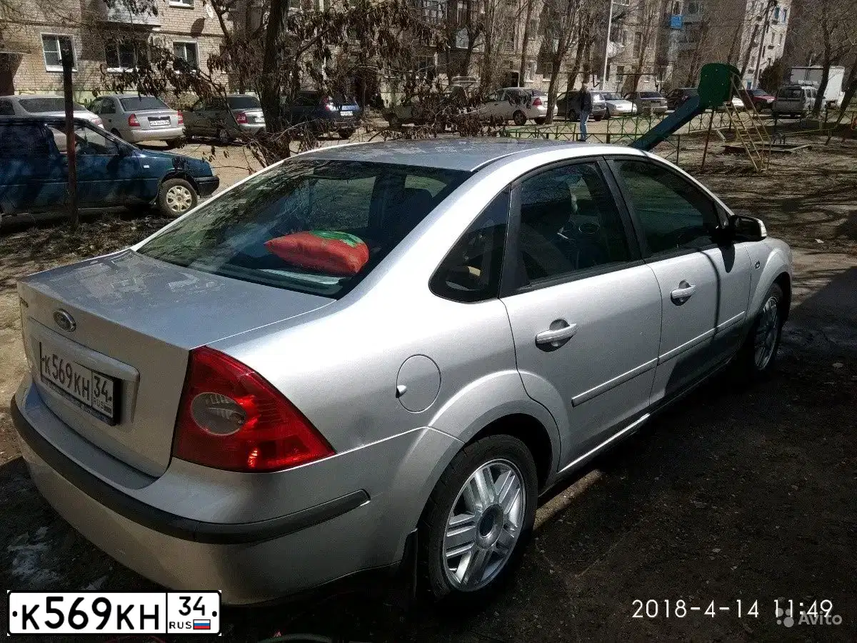 Фото автомобиля FORD FOCUS, 2007 — госномер К569КН34. Цвет: Серебристый