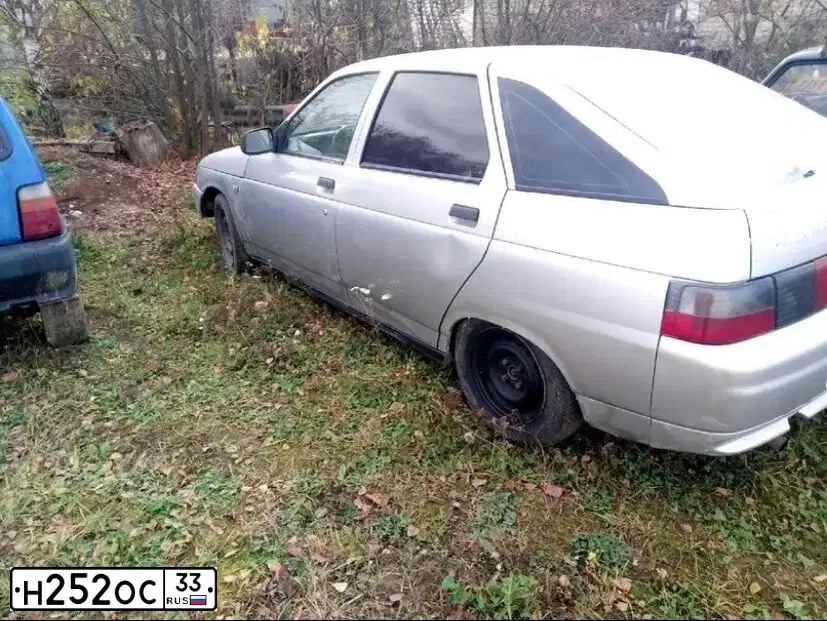 Фото автомобиля LADA 2112, 2003 — госномер Н815КН33. Цвет: ЧЕРНЫЙ