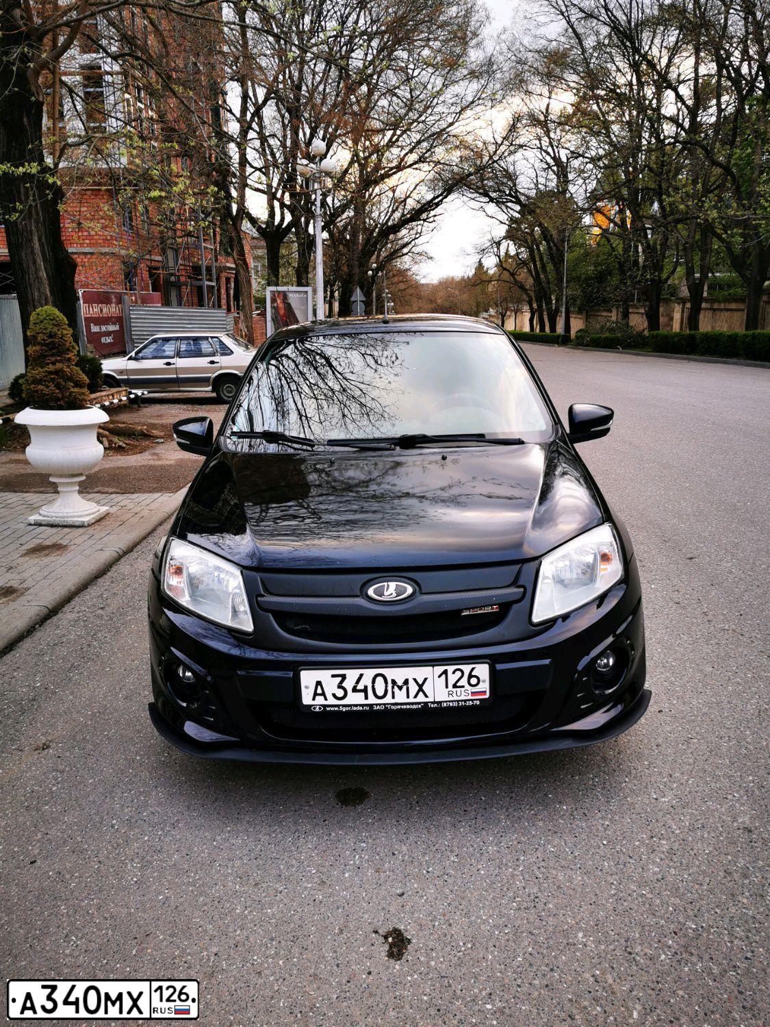 Фото автомобиля LADA 2190 GRANTA, 2014 — госномер Н149ТР126. Цвет: ЧЕРНЫЙ