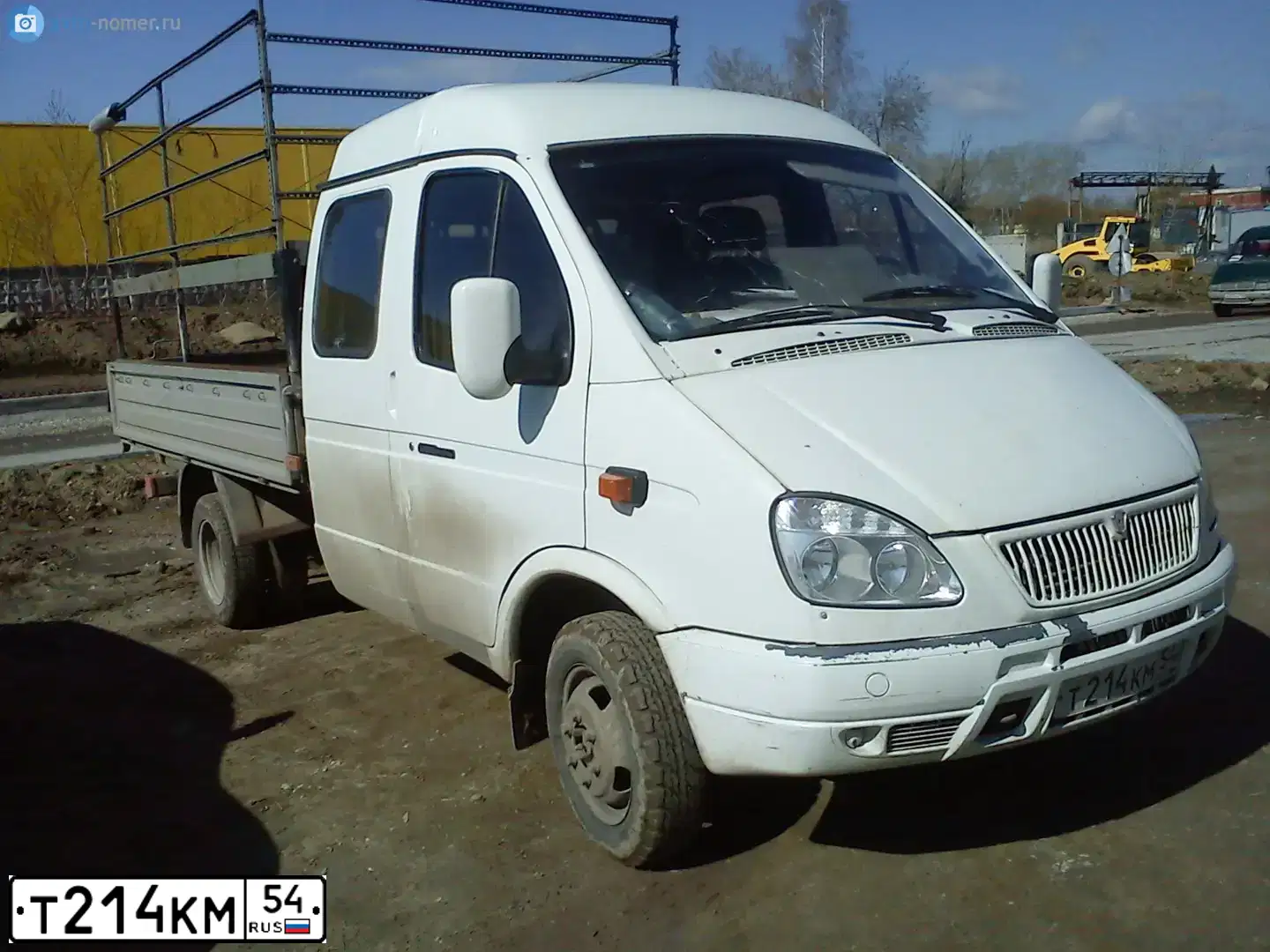 Фото автомобиля GAZ 3302 EL, 2007 — госномер Т214КМ54. Цвет: БЕЛЫЙ