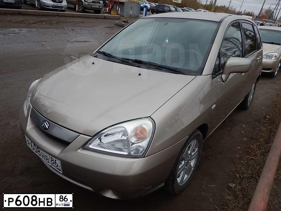Фото автомобиля SUZUKI LIANA, 2003 — госномер Т895КО55. Цвет: СЕРЫЙ