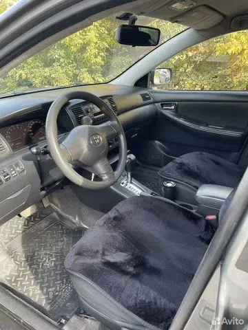Фото автомобиля TOYOTA COROLLA, 2005 — госномер В499КО72. Цвет: Серый