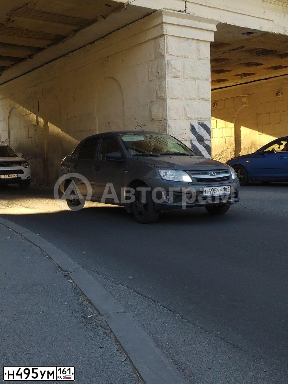 Фото автомобиля LADA 2190 GRANTA, 2015 — госномер Н495УМ161. Цвет: СЕРЫЙ ТЕМНЫЙ
