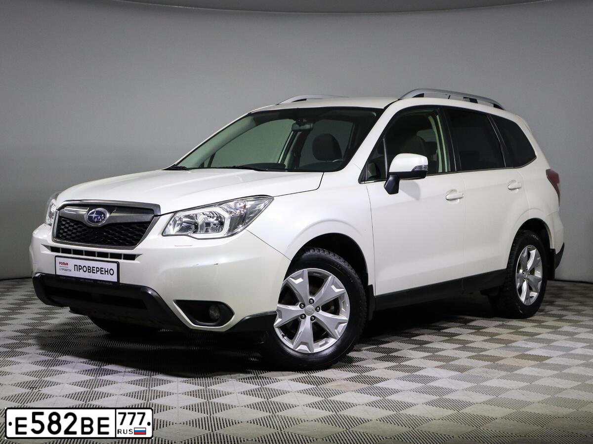 Фото автомобиля SUBARU FORESTER, 2013 — госномер Е582ВЕ777. Цвет: БЕЛЫЙ