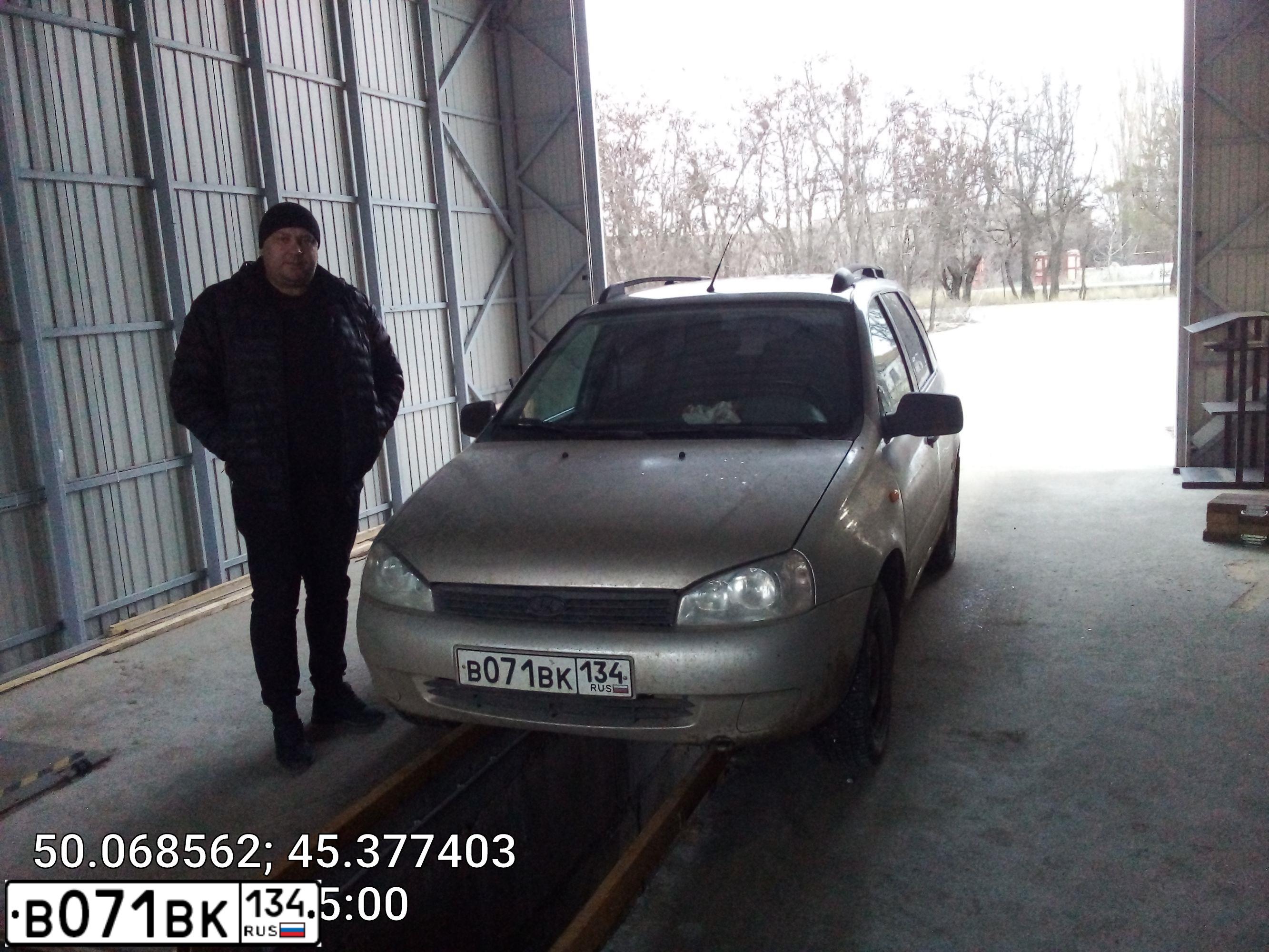 Фото автомобиля LADA 1117 KALINA, 2012 — госномер В162РС21. Цвет: СЕРО БЕЖЕВЫЙ