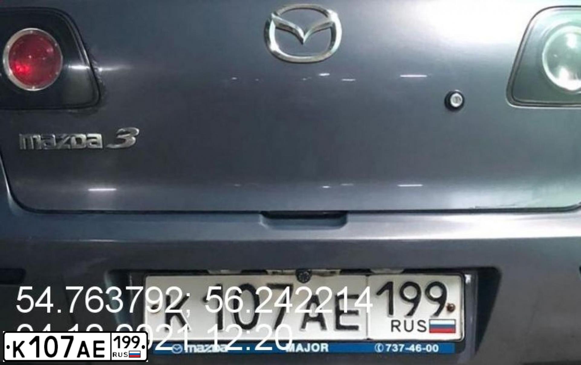 Фото автомобиля MAZDA 3, 2007 — госномер К107АЕ199. Цвет: СЕРЫЙ