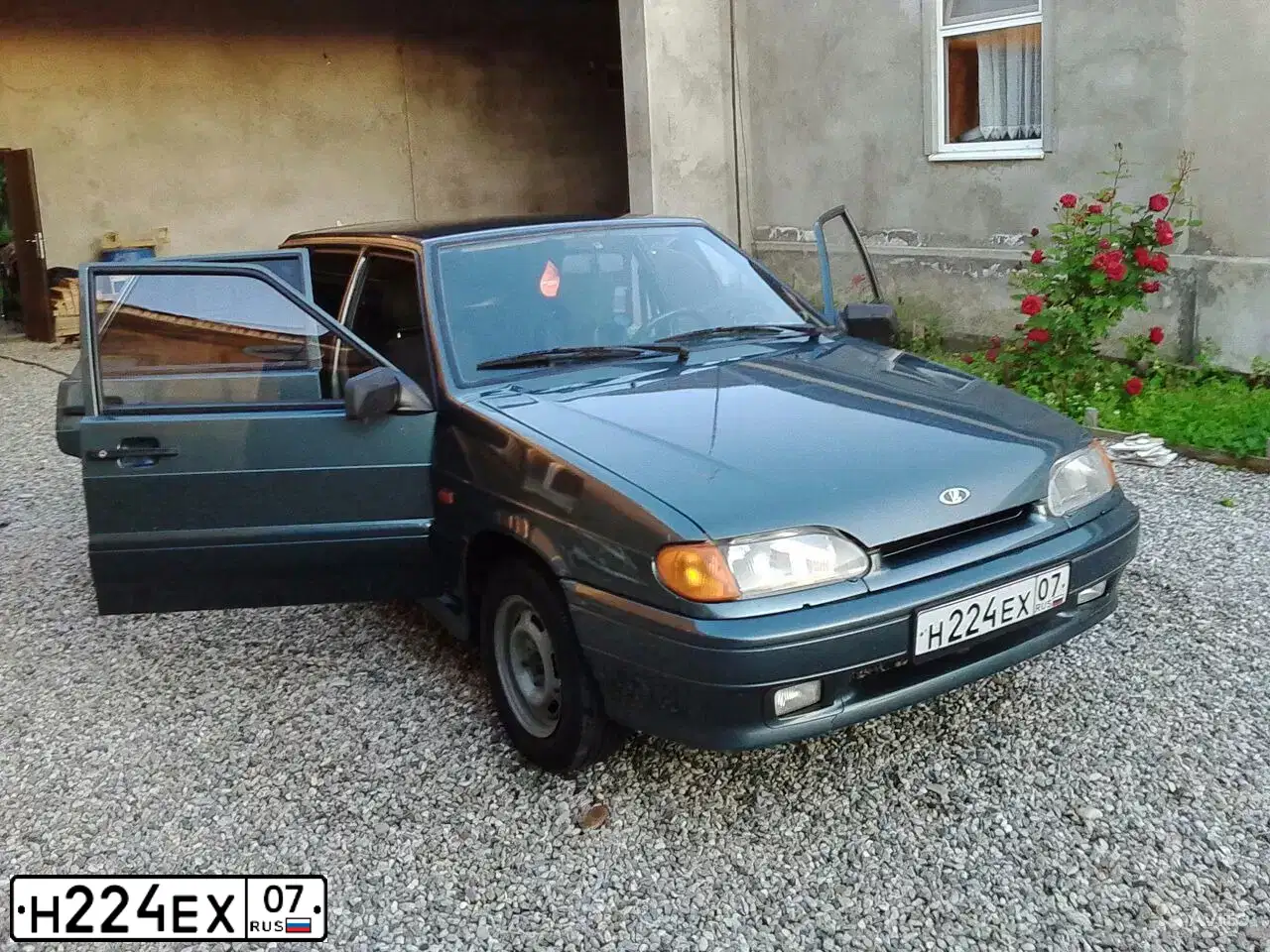 Фото автомобиля LADA 2114 SAMARA, 2007 — госномер Н224ЕХ07. Цвет: СЕРО-СИНЕ-ЗЕЛЕНЫЙ
