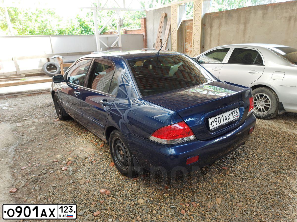 Фото автомобиля MITSUBISHI LANCER, 2004 — госномер О901АХ123. Цвет: синий