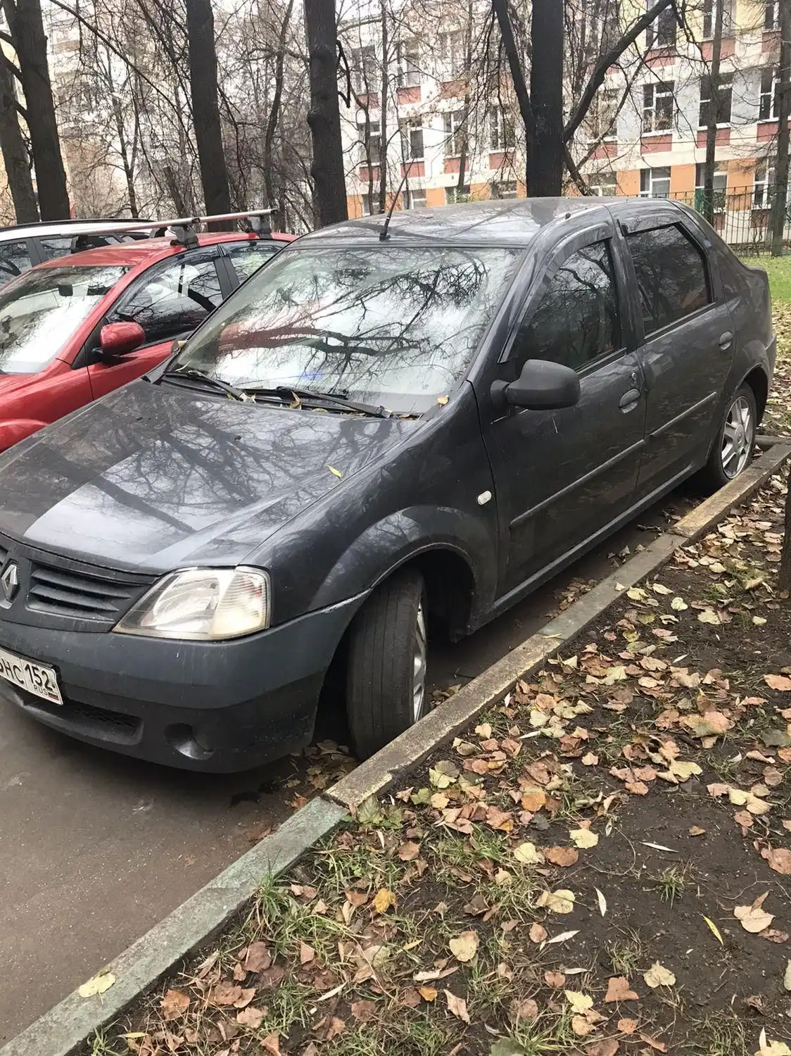 Фото автомобиля RENAULT LOGAN, 2007 — госномер У404НУ67. Цвет: ТЕМНО-СЕРЫЙ