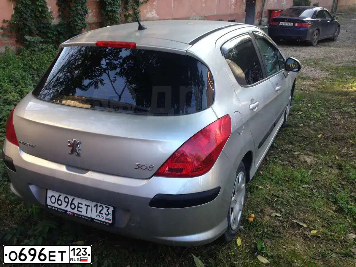 Фото автомобиля PEUGEOT 308, 2009 — госномер Н196НО761. Цвет: СИНИЙ ТЕМНЫЙ