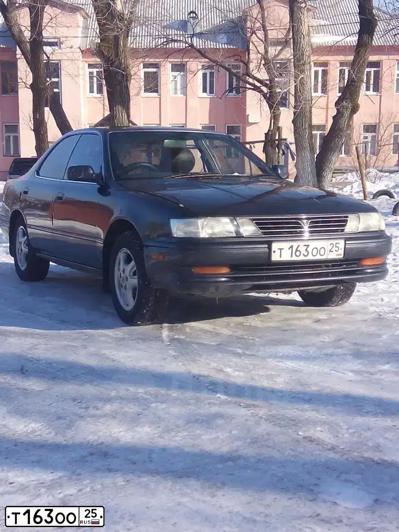 Фото автомобиля KIA SPECTRA, 2007 — госномер Т163ОО25. Цвет: Алмазное серебро (Иные)