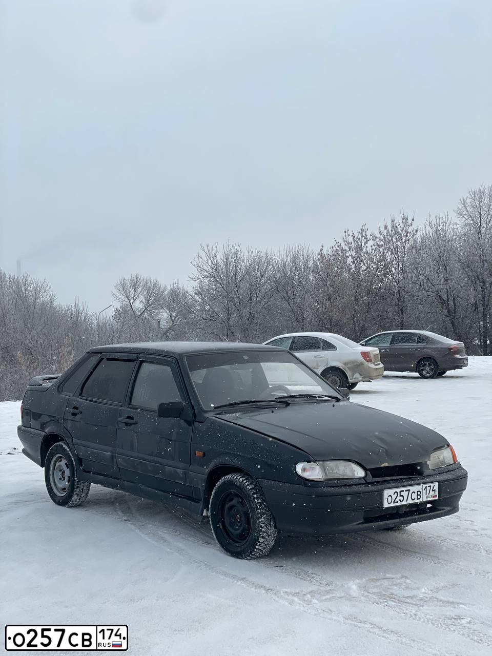 Фото автомобиля LADA 2115 SAMARA, 2005 — госномер О257СВ174. Цвет: ЧЕРНЫЙ
