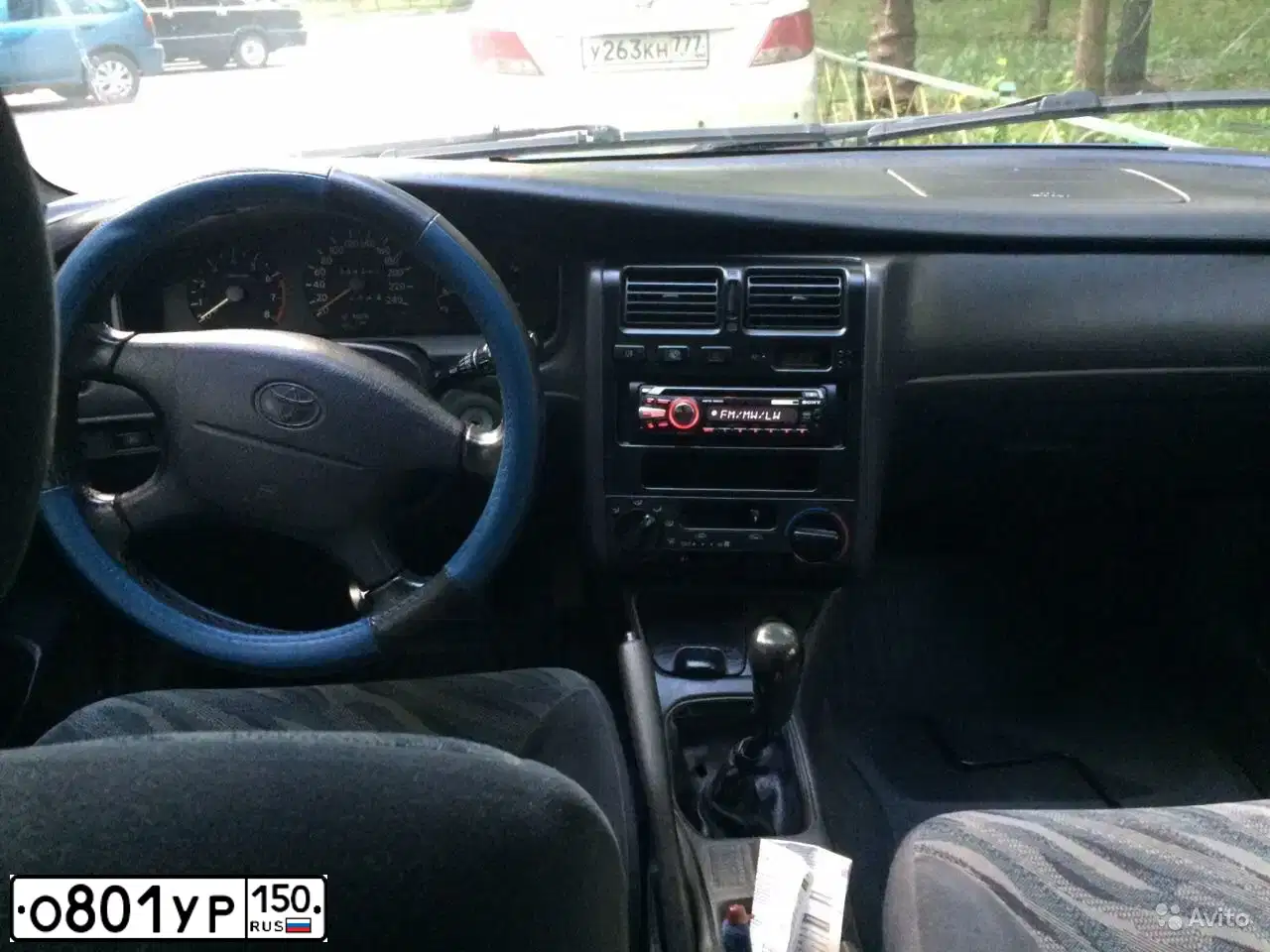 Фото автомобиля TOYOTA CARINA, 1996 — госномер О801УР150. Цвет: СИНИЙ