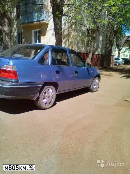 Фото автомобиля DAEWOO NEXIA, 2006 — госномер М805КМ02. Цвет: ПЕРЛАМУТРОВО-ГОЛУБОЙ