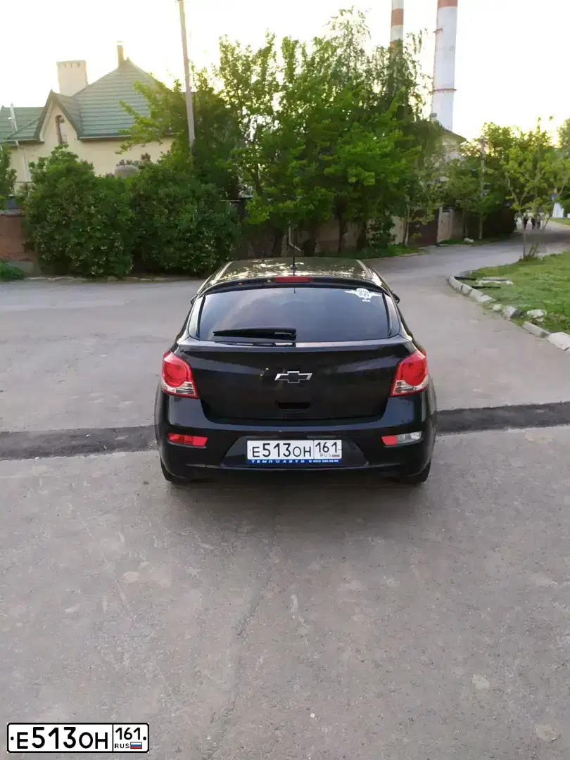 Фото автомобиля ШЕВРОЛЕ КРУЗ KL1J, 2012 — госномер Н099АВ181. Цвет: ЧЕРНЫЙ МЕТАЛЛИК