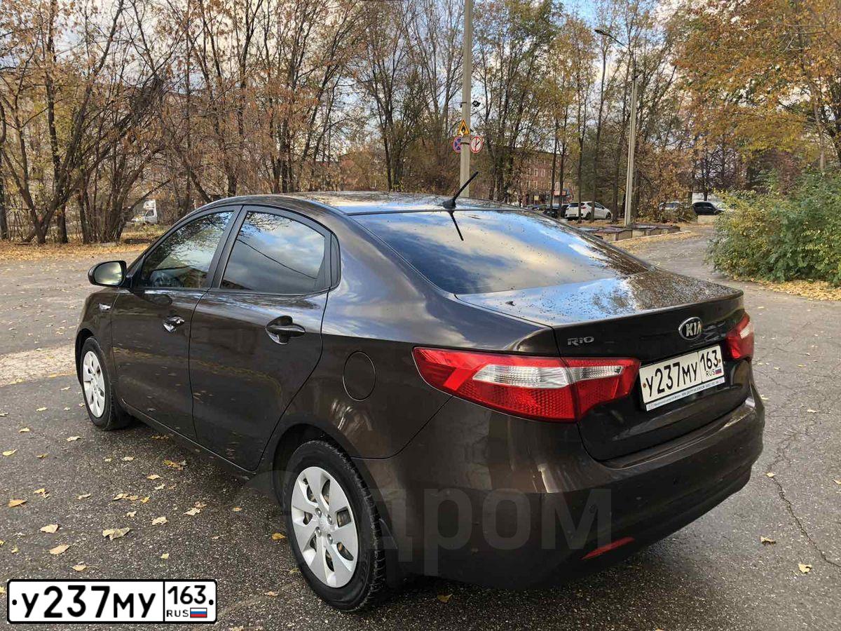 Фото автомобиля KIA RIO, 2015 — госномер А314МЕ156. Цвет: Коричневый