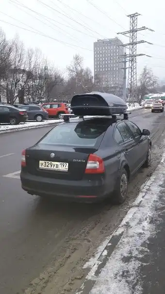Фото автомобиля SKODA OCTAVIA, 2012 — госномер У329УВ197. Цвет: ЧЕРНЫЙ