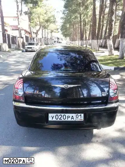 Фото автомобиля LEXUS LX, 2006 — госномер М020РА01. Цвет: ЧЕРНЫЙ