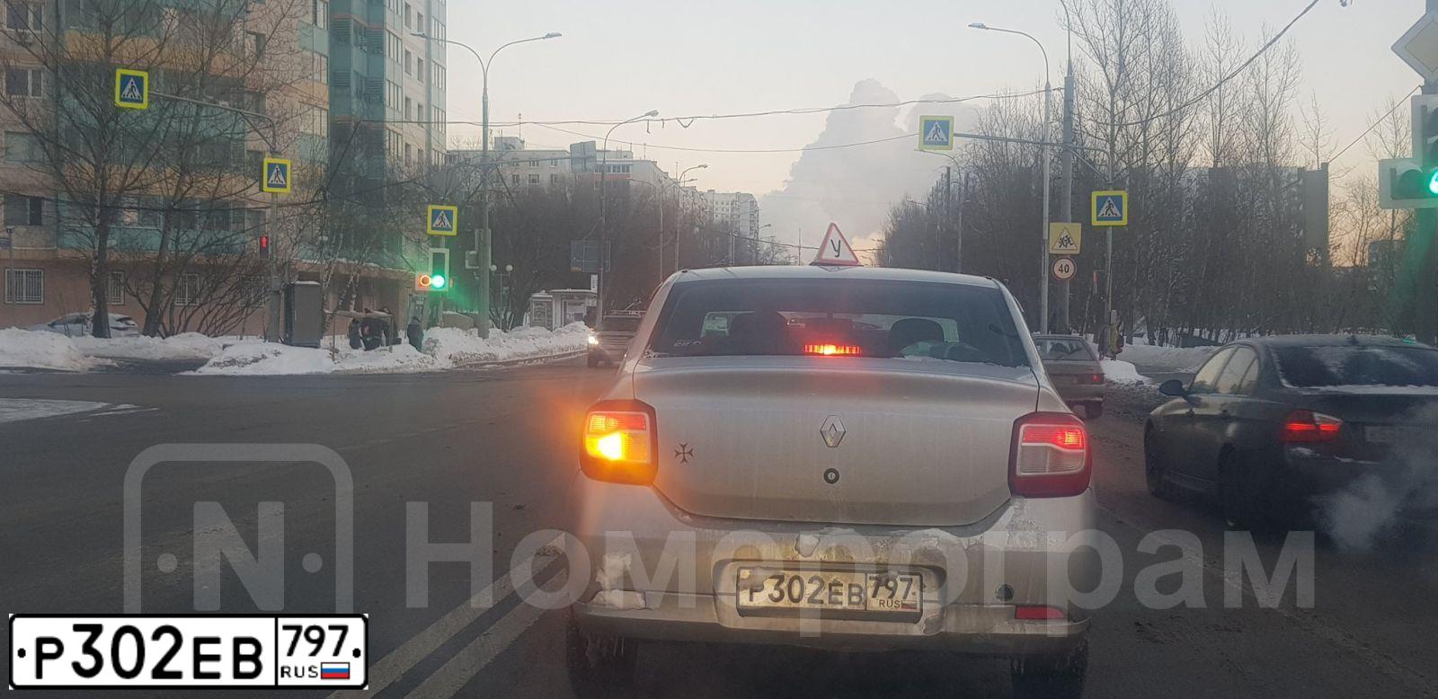 Фото автомобиля RENAULT LOGAN, 2018 — госномер Р302ЕВ797. Цвет: СВЕТЛО-СЕРЫЙ