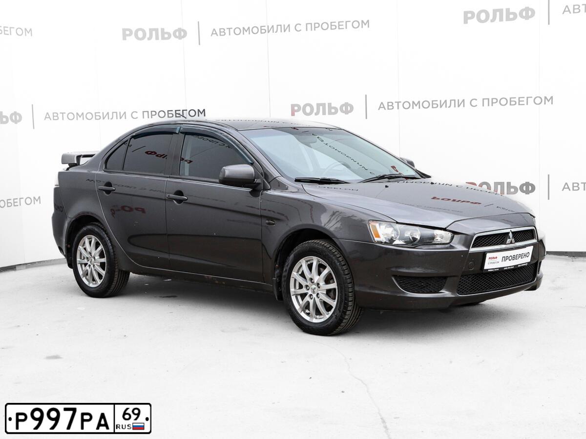 Фото автомобиля MITSUBISHI LANCER, 2010 — госномер Р696АР250. Цвет: СЕРЫЙ