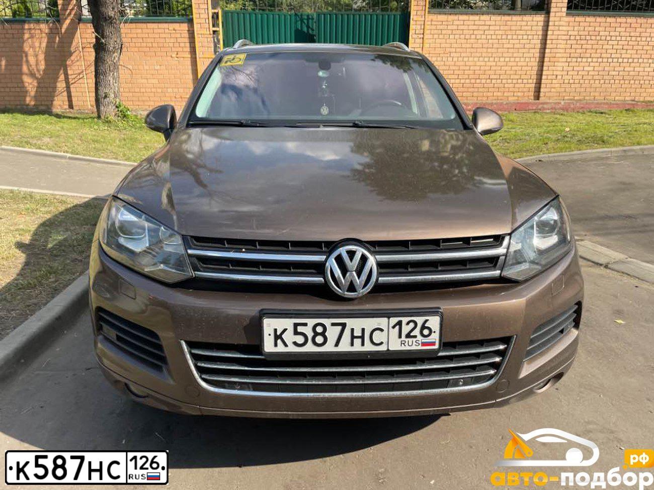Фото автомобиля VOLKSWAGEN TOUAREG, 2012 — госномер У883КТ716. Цвет: Коричневый