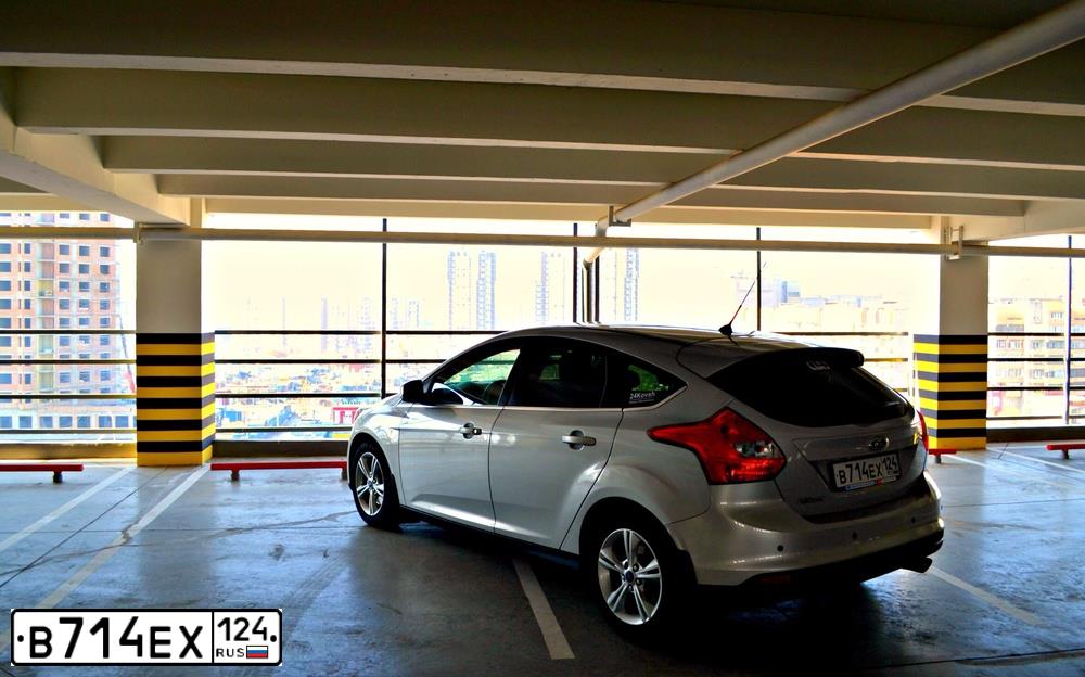 Фото автомобиля FORD D FOCUS, 2012 — госномер В714ЕХ124. Цвет: Серый