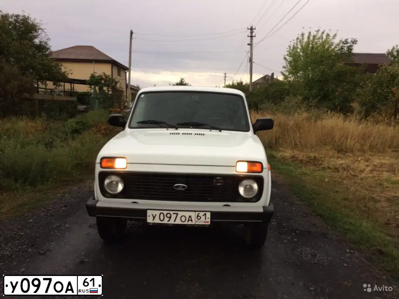 Фото автомобиля LADA 2121 NIVA, 2003 — госномер О584ТТ161. Цвет: БЕЛЫЙ ЯРКИЙ