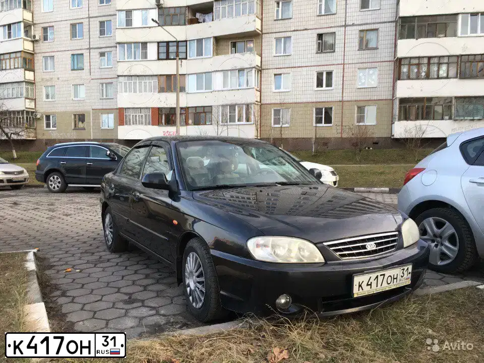 Фото автомобиля KIA SPECTRA, 2007 — госномер Т606ОУ31. Цвет: Черный жемчуг (Чёрный)