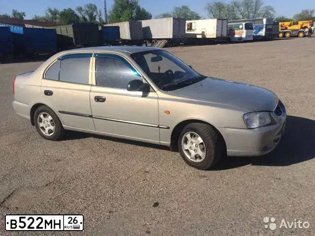 Фото автомобиля TAGAZ ACCENT, 2008 — госномер Е112ЕА08. Цвет: СВЕТЛО-БЕЖЕВЫЙ