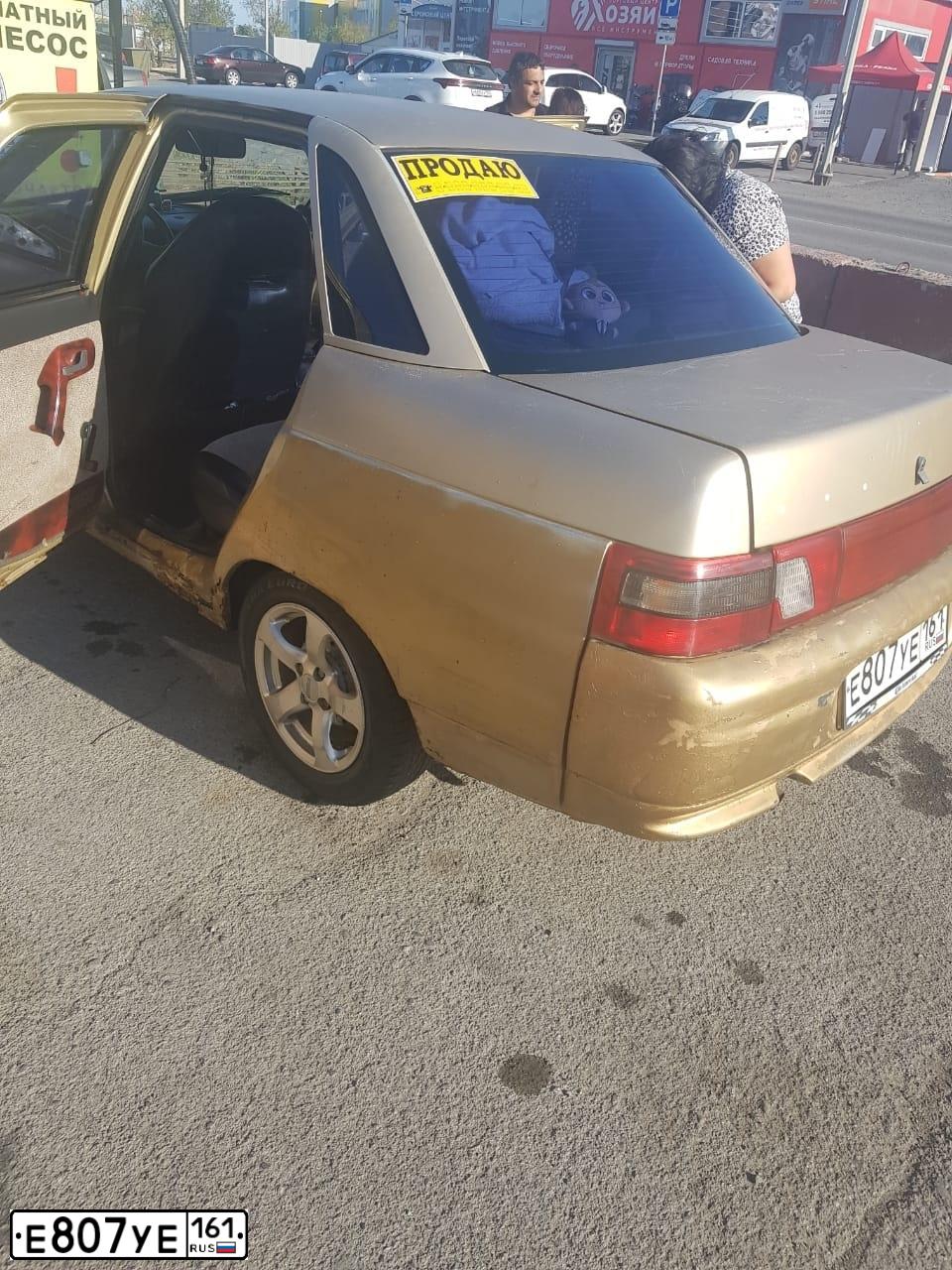 Фото автомобиля LADA 2110, 2005 — госномер Е807УЕ161. Цвет: СЕРЕБРИСТО-БЕЖЕВЫЙ