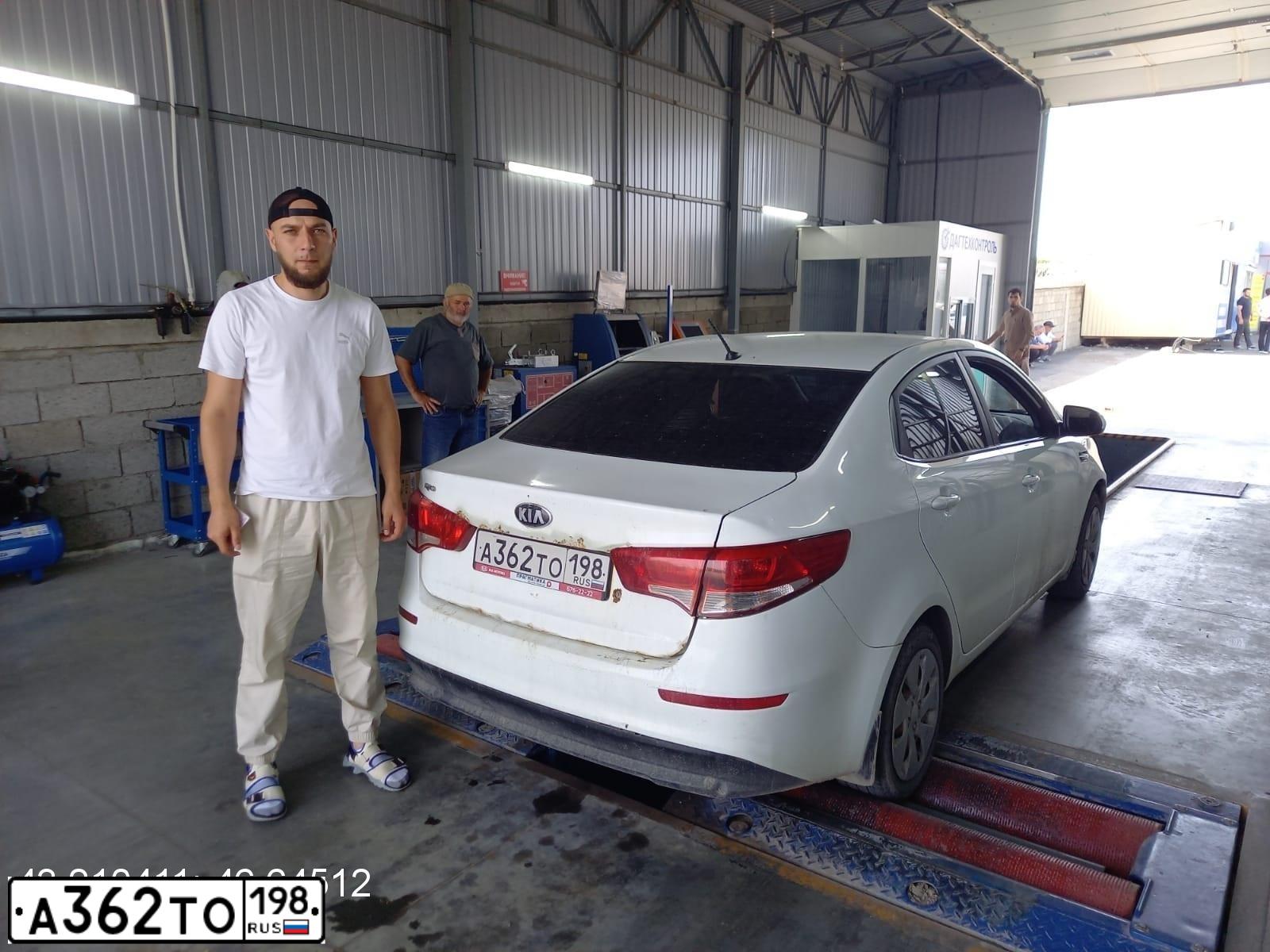Фото автомобиля KIA RIO, 2015 — госномер Т259ОО05. Цвет: Белый