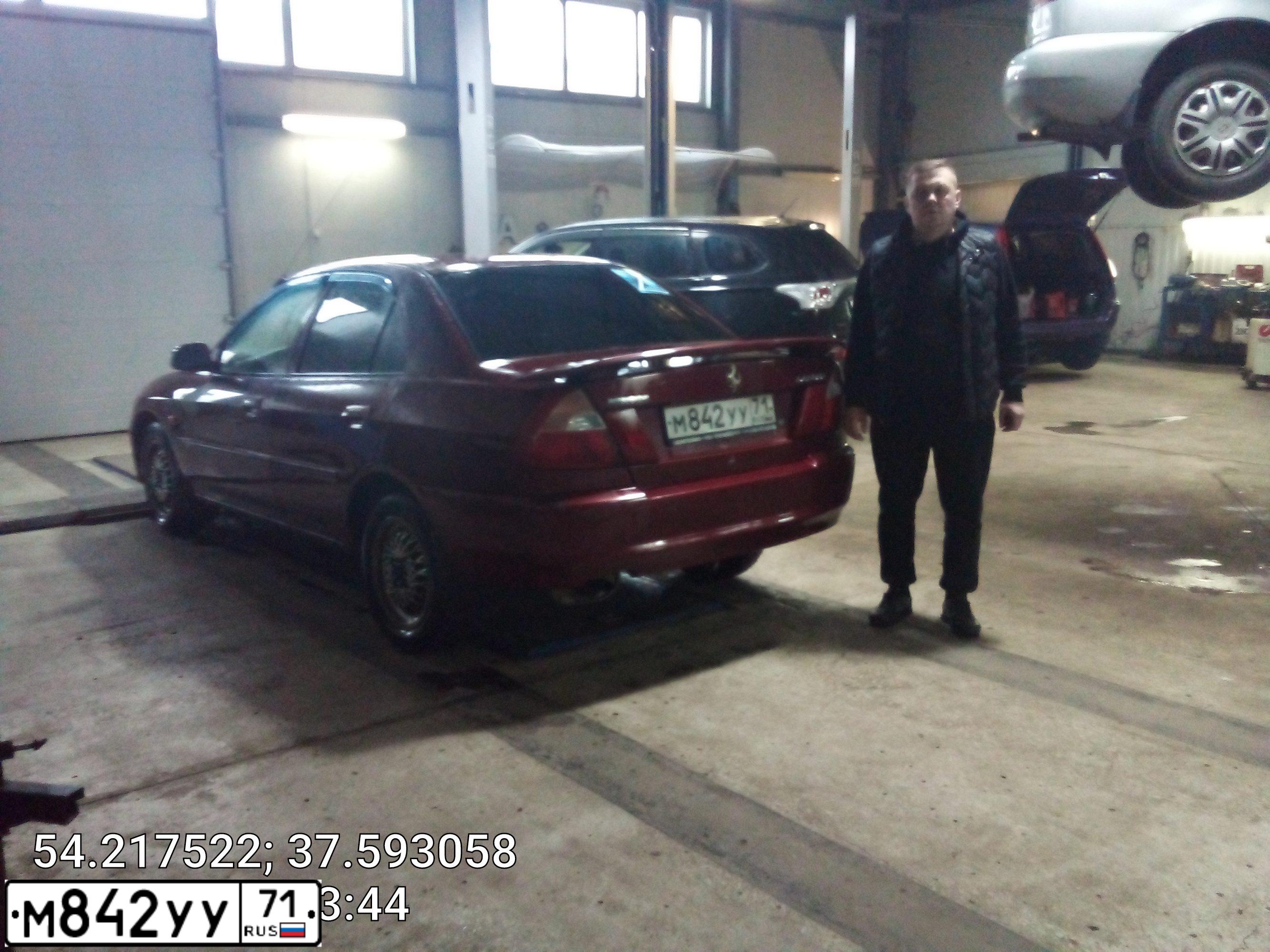 Фото автомобиля MITSUBISHI LANCER, 2000 — госномер Т277ТУ790. Цвет: ВИШНЕВЫЙ