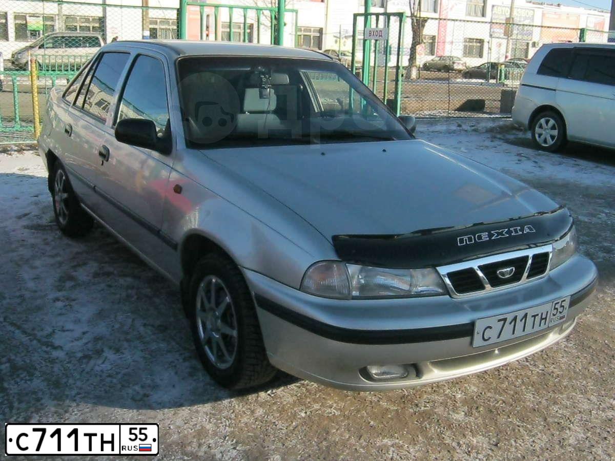 Фото автомобиля DAEWOO NEXIA, 2007 — госномер С711ТН55. Цвет: ПЕРЛАМУТРОВО-СЕРЕБРИСТЫЙ